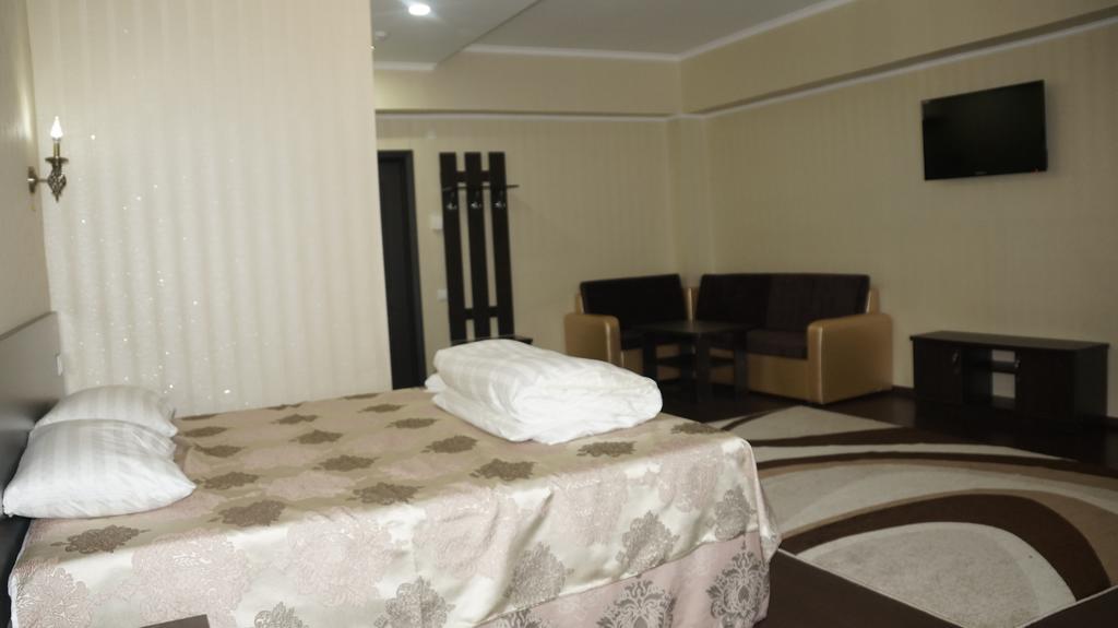 Home Hotel Astana Habitación foto