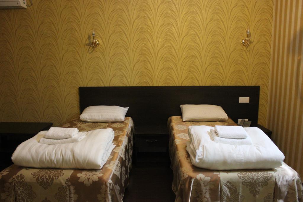 Home Hotel Astana Habitación foto