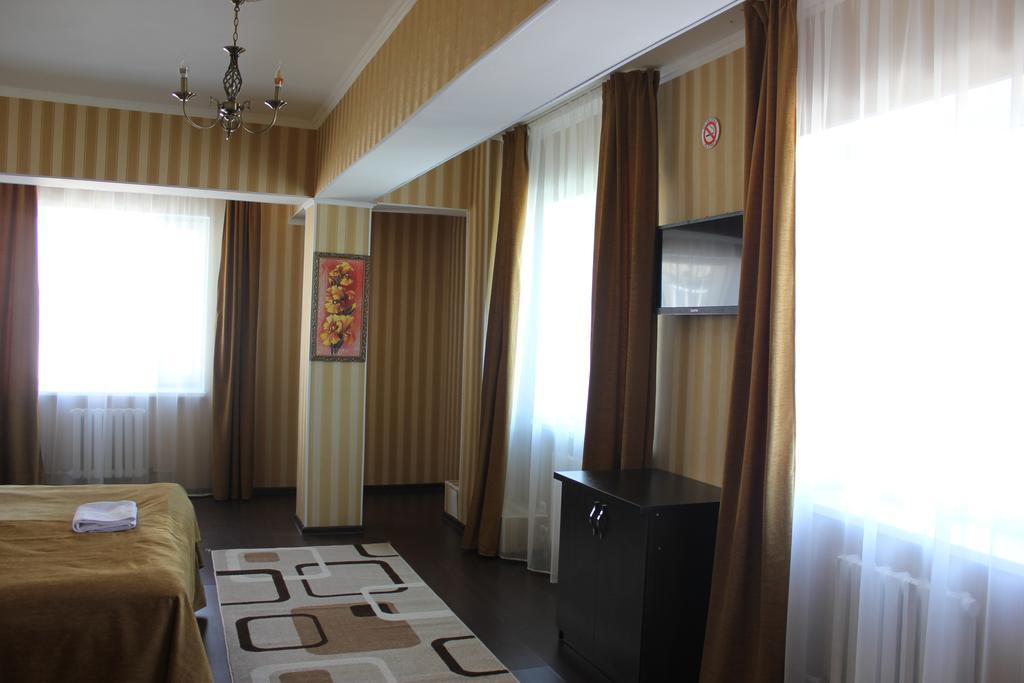 Home Hotel Astana Habitación foto